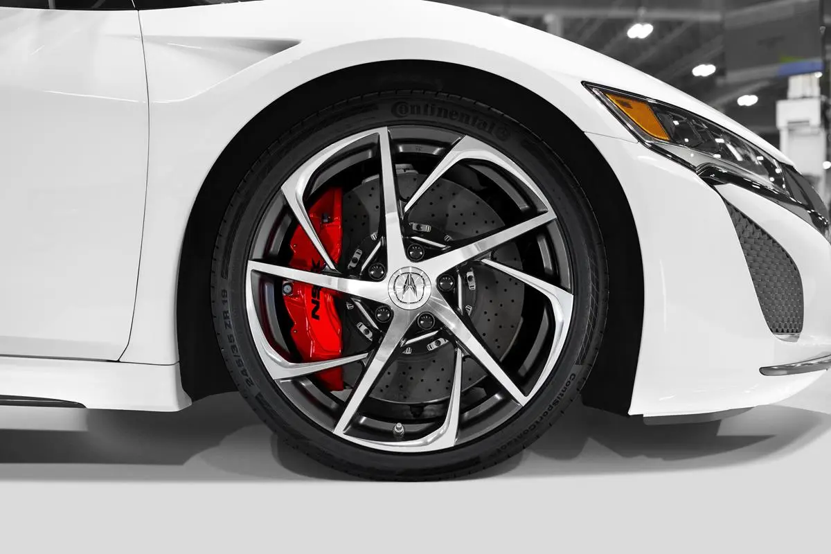 Acura has released technical details about the hybrid sports car, including its all-wheel drive platform and planned production for the 2017 model year