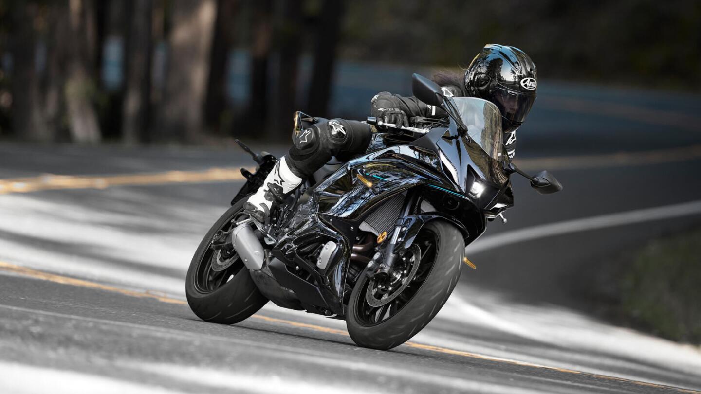 Highly reflective gloss black doesn't seem to do the bike's lines many favors in road photos