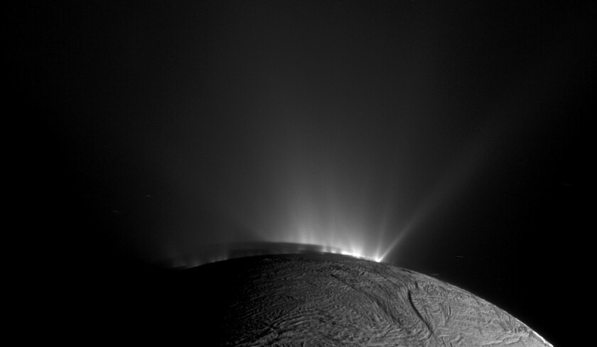 A Cassini image from 2010 of the water vapor plumes spraying through the cracks in the icy shell, at the south pole of Enceladus