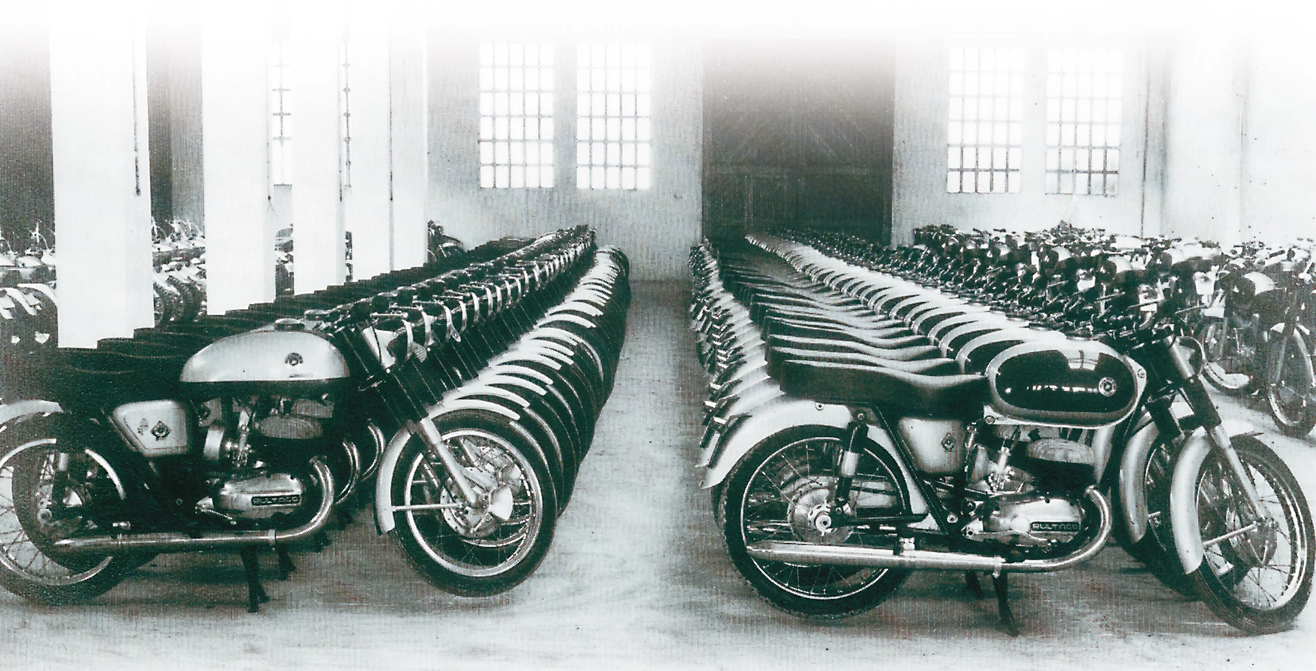 Bultaco's factory output during the sixties was immense - here, a line-up of Metralla and Saturno models await delivery