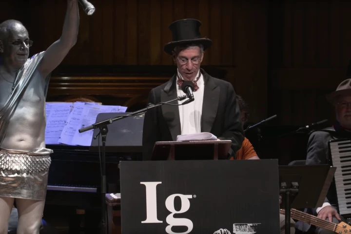 Marc Abrahams, originator and emcee of the annual Ig Nobel Prize celebration, under the spotlight at the 2019 ceremony