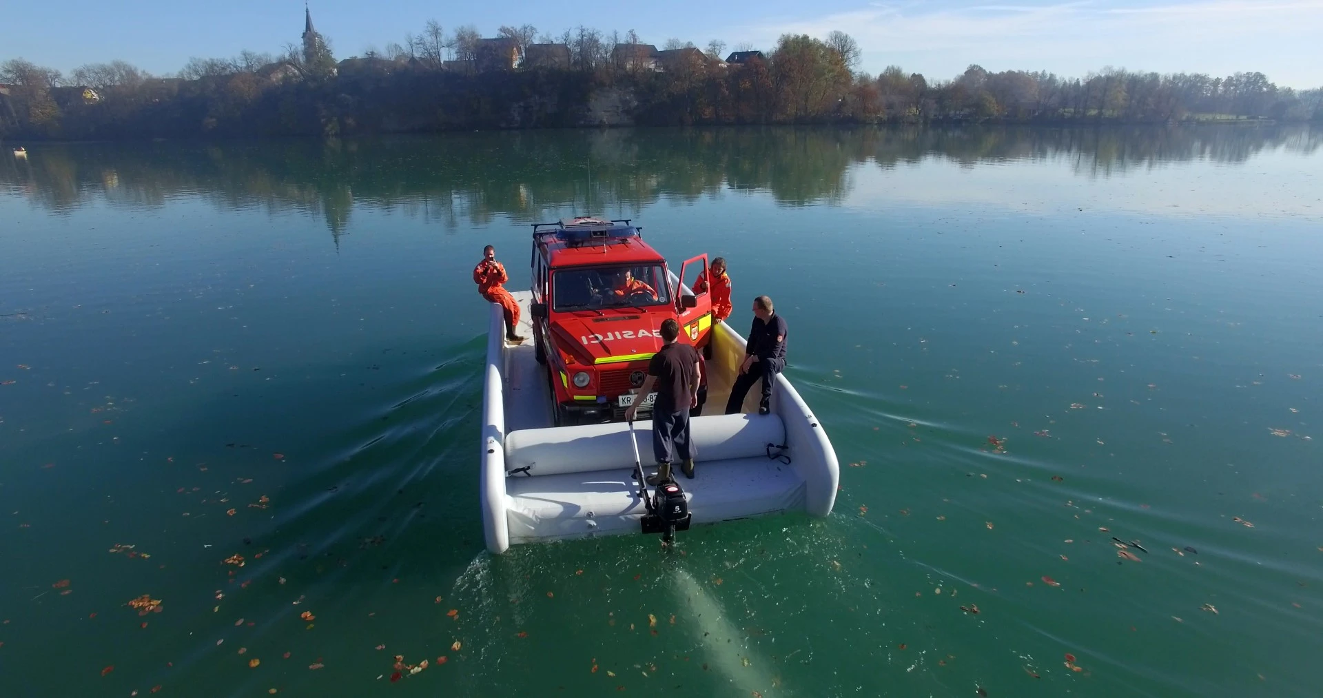The Hovercraft Ferryboat transporting a car across a lake