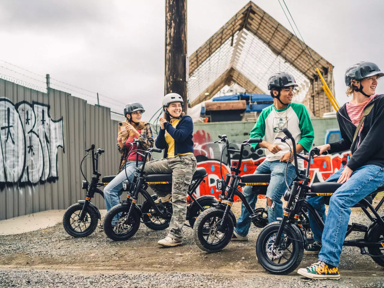 14-inch wheels wearing fat tires, mechanical disc brakes, long padded seat, high-rise handlebars and auto-on lighting