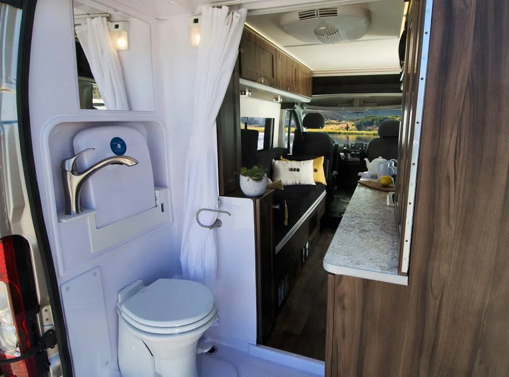 Carado's new Axion Studio includes a rear bathroom with sit-down/stand-up shower, toilet and sink