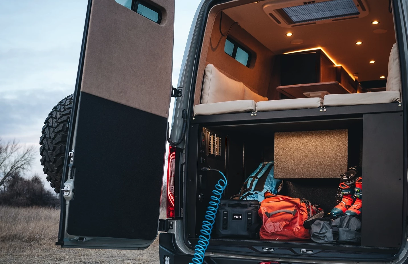 Similar to the more common raised rear bed, the raised lounge frees up garage space below