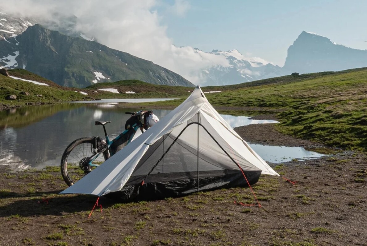 Ultra-packable sub-2-lb tent uses your bike as part of the frame