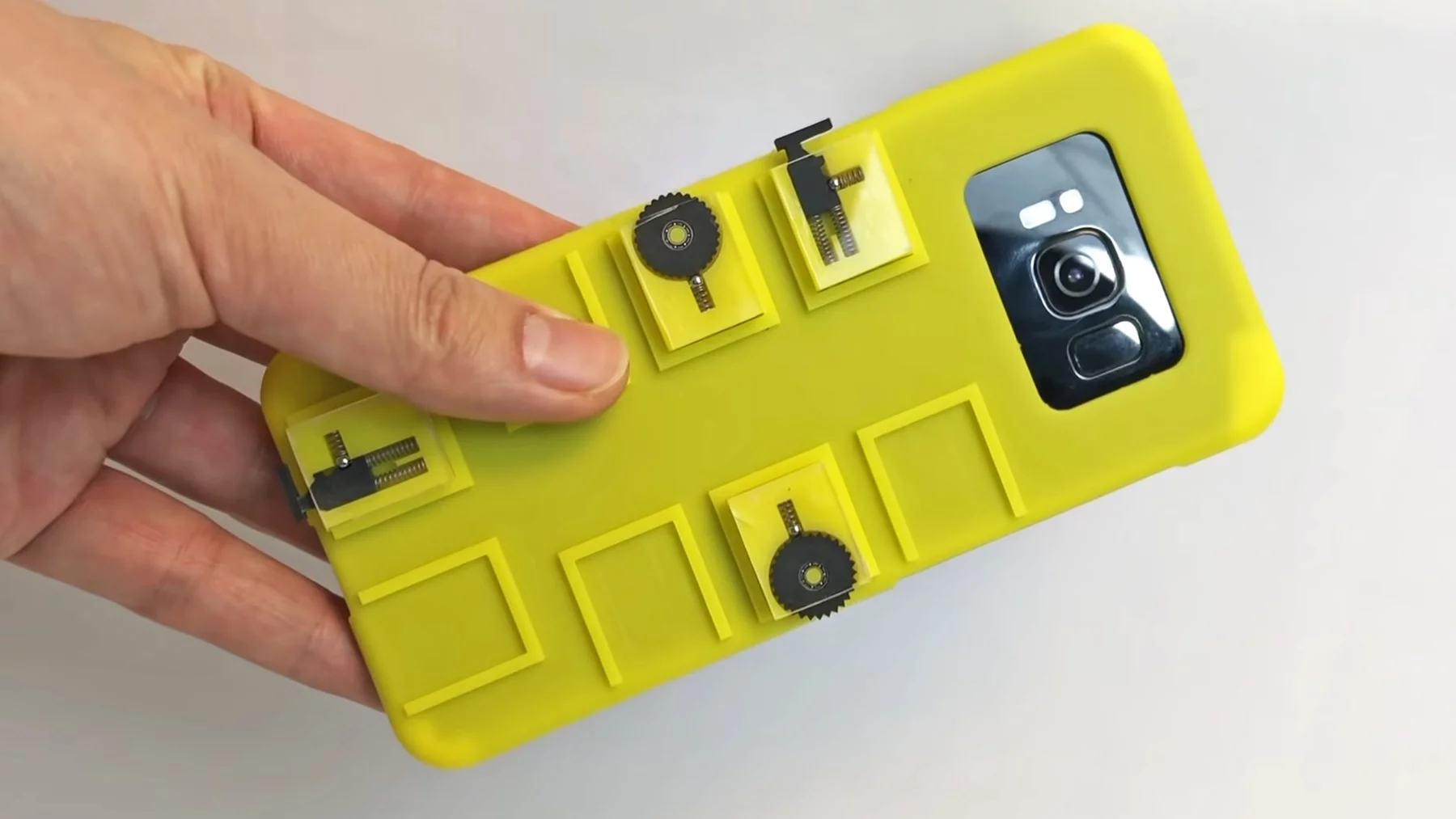 The vidgets case adds modular switches and buttons to a phone