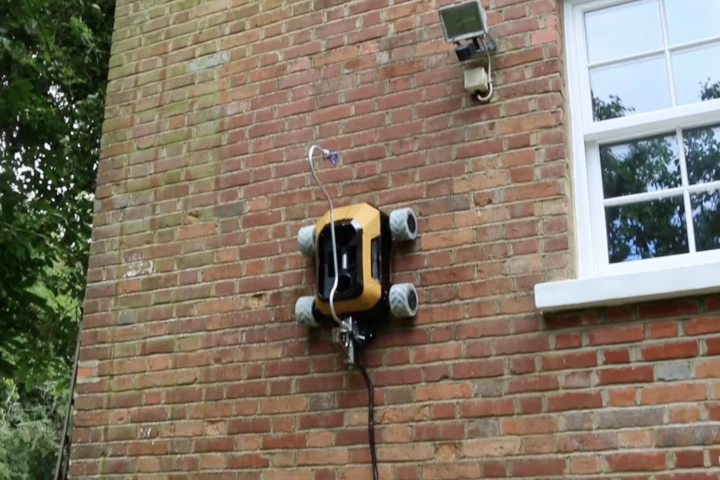 The HB1 utilizes dual fans to create a vacuum between its underside and the wall