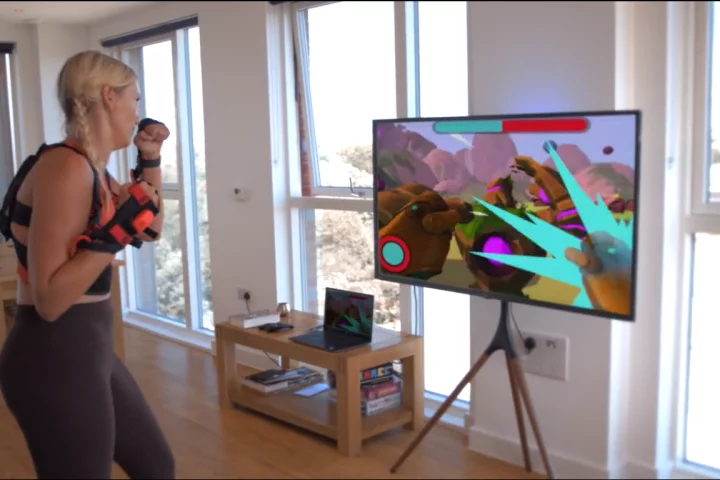 Quell is a fitness game played using motion-sensing gloves and resistance straps