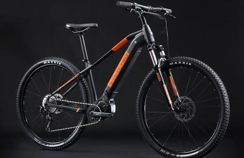 Features a drop-down frame-integrated battery and front fork suspension with 100 mm of travel
