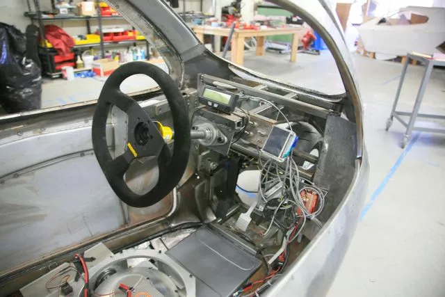 The prototype's steering wheel, pedals and instrumentation (Photo: Randolph Jonsson/Gizmag)
