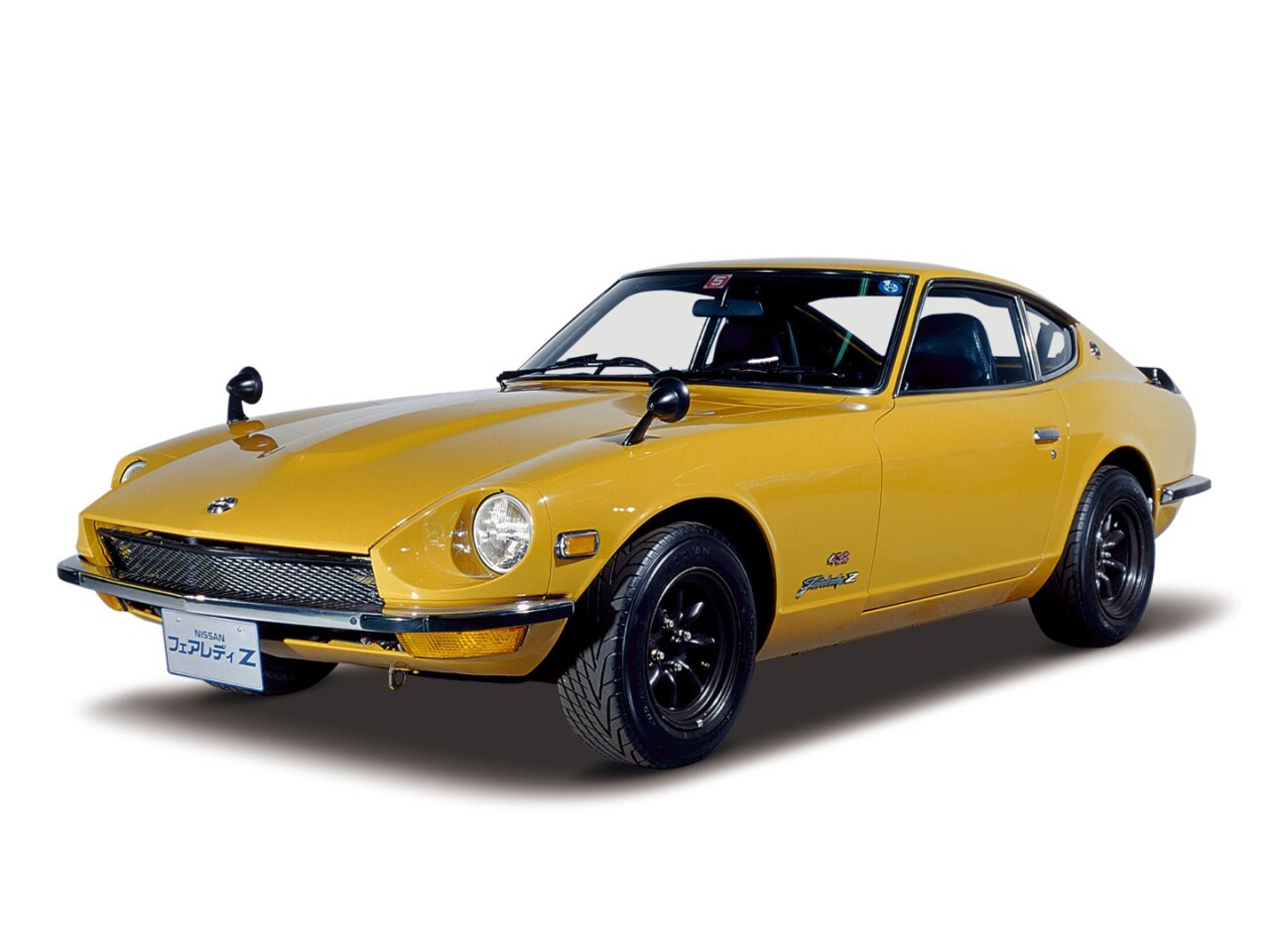 Yellow and black 1969 Nissan Fairlady Z 432