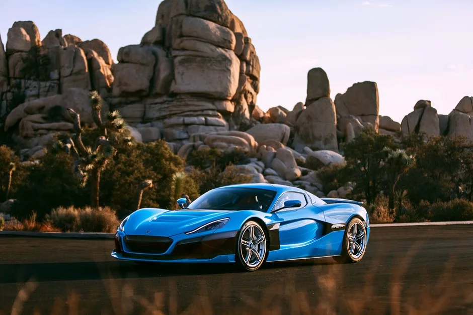 The Rimac C_Two California has electric blue paint, room for two champagne bottles, and will be featured at the Petersen Automotive Museum this week