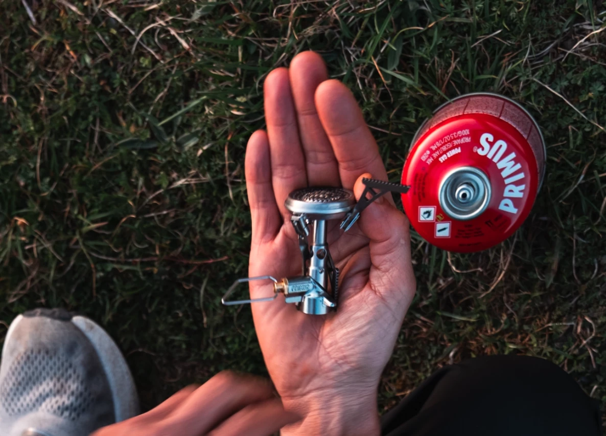 The Micron III's three individual pot supports and its burner control fold down for sleek carry