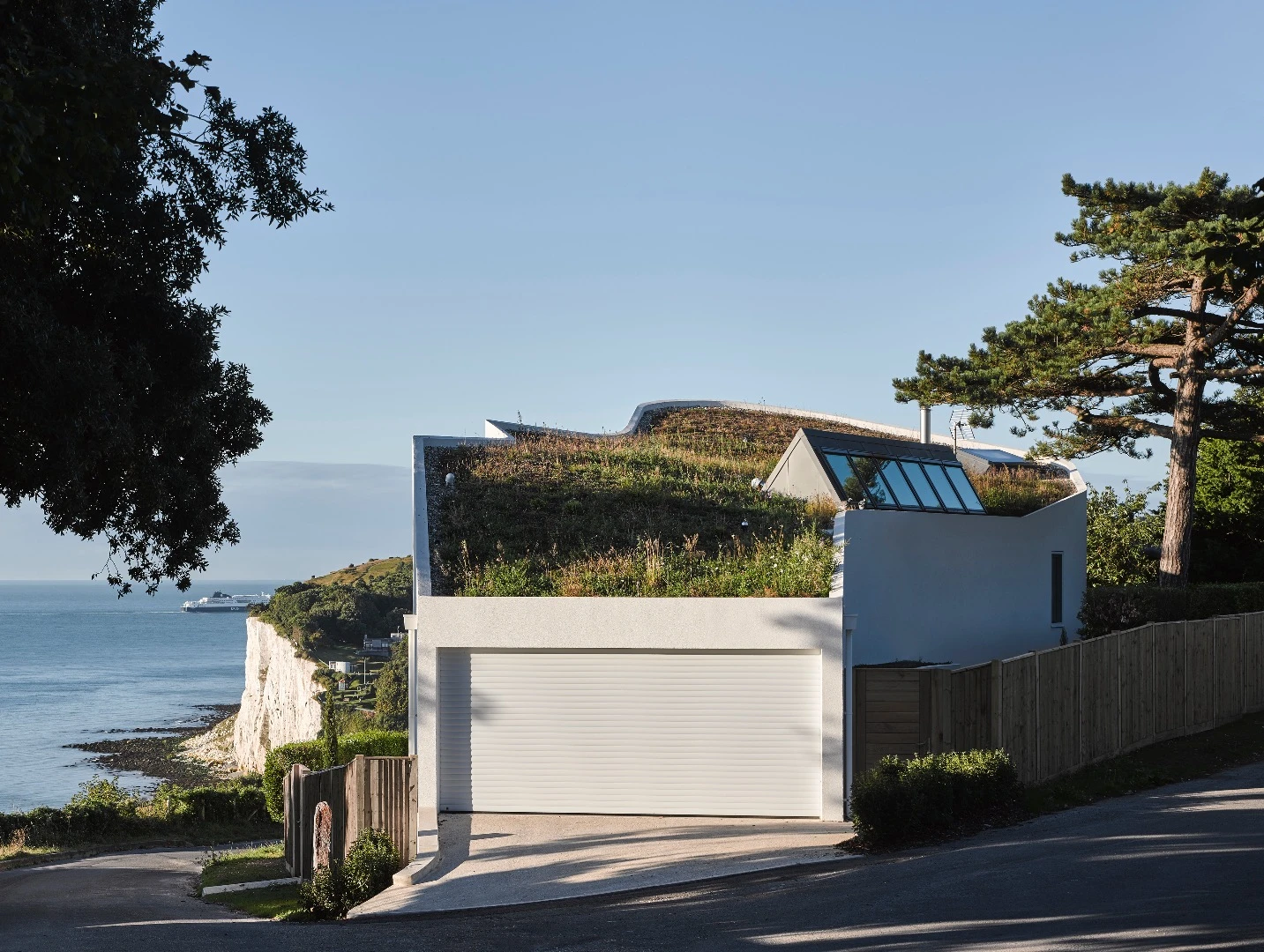 "Ness Point has been designed as if it had grown out of the land in which it is embedded," says RIBA. "With undulating thick walls along its length, it hunkers into the hill and is at one with the dramatic landscape of the White Cliffs of Dover. It goes further than respecting its setting, to really speaking of ‘place’."