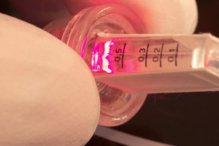 The prototype implant, with its near-infrared LED