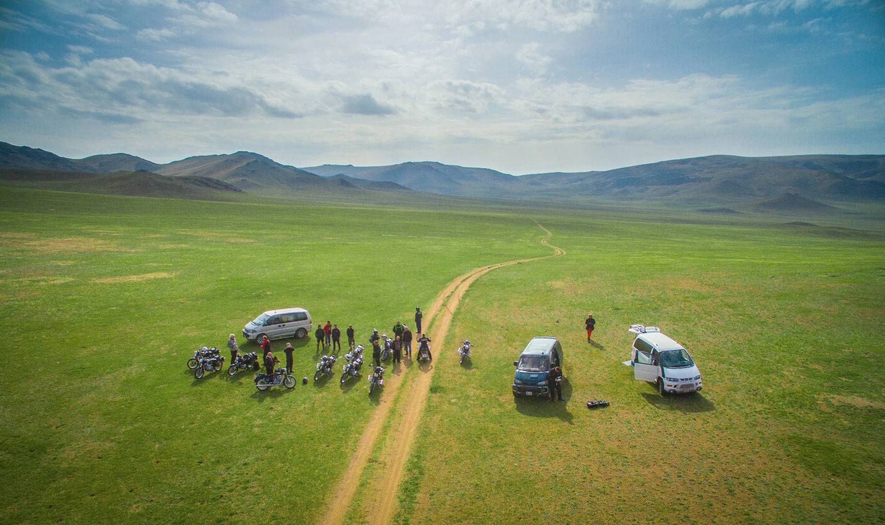 The group stops to enjoy the view, open plains near Yaruu