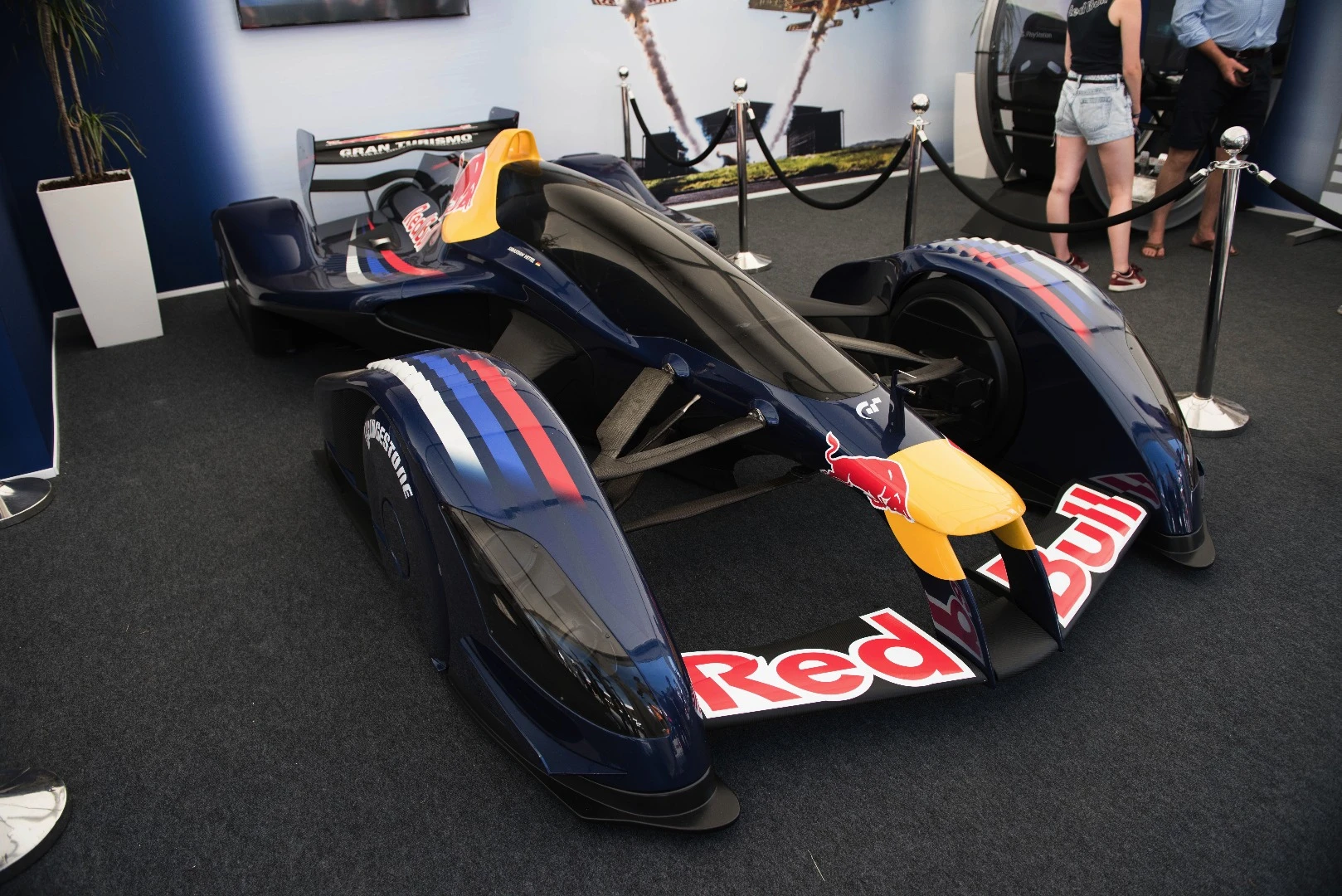 Now it's unlikely you've ever seen one of these before, unless you're a devotee of the PlayStation 3 video game Gran Turismo 5 or Gran Turismo 6 or you've been to the Red Bull Museum. The Red Bull X2010 (originally named Red Bull X1) is a prototype vehicle designed by the world's most successful Formula One race car designer, Adrian Newey in response to a request by Gran Turismo chief Kazunori Yamauchi's for Newy to build "the fastest racing car on land, one that throws aside all rules and regulations". The prototype was designed by Newey (then Red Bull Racing's Chief Technical Officer) in conjunction with Yamauchi. It features enclosed wheels, and a "fan element" to increase low and medium-speed downforce (much like a Chaparral 2J or Brabham BT46B)