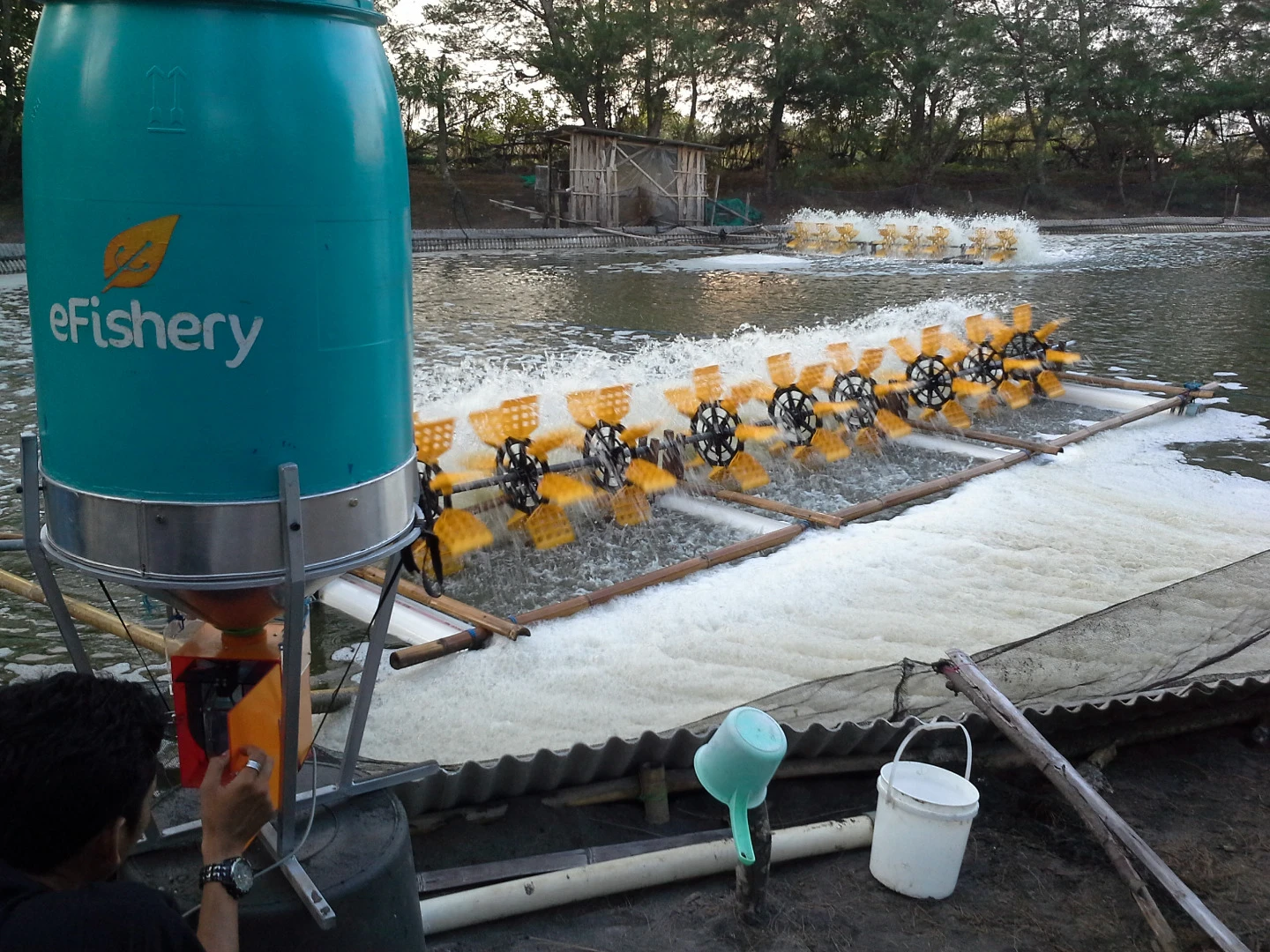 eFishery’s automatic smart feeder uses sensors to detect hungry fish behavior and dispense the right amount of feed
