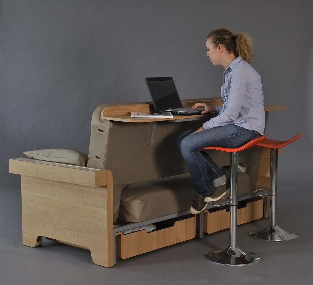 Story features an oversized headboard which, with the addition of bar stools, can be used as a workstation