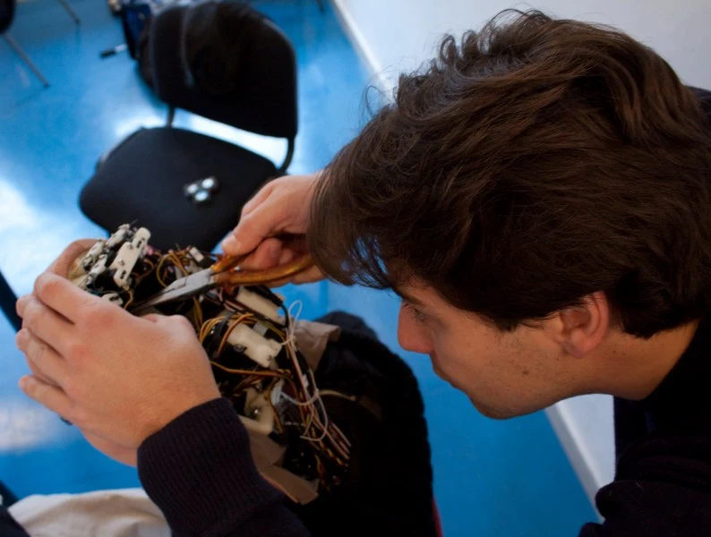 Thirty-two servo motors are integrated in the android skull and neck