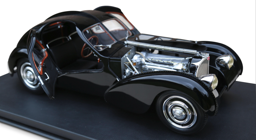 Number 12 of a limited edition of 99 one eighth scale models of a 1938 Bugatti 57 SC Atlantic model commissioned by Ralph Lauren. Lauren is one of just three people in the world to own a real Bugatti 57 SC Atlantic, which just coincidentally, is a black one and can be seen here. This model sold for $19,134 (€15,625)