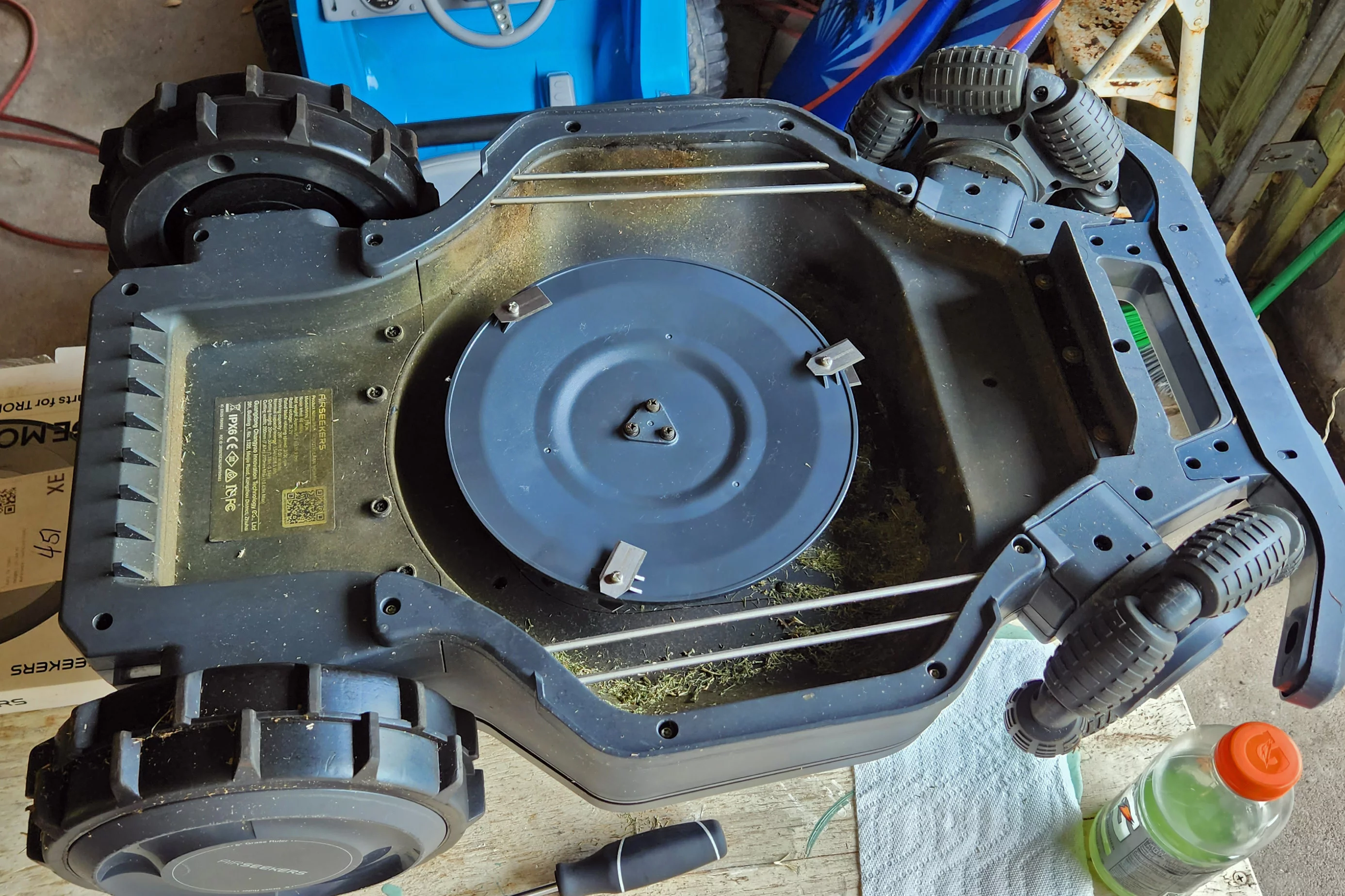 Once I moved it back over to my house, I chucked the big disk on there for more plow-estate. That meant removing the shroud. It took me five mins and a Phillips. No big deal