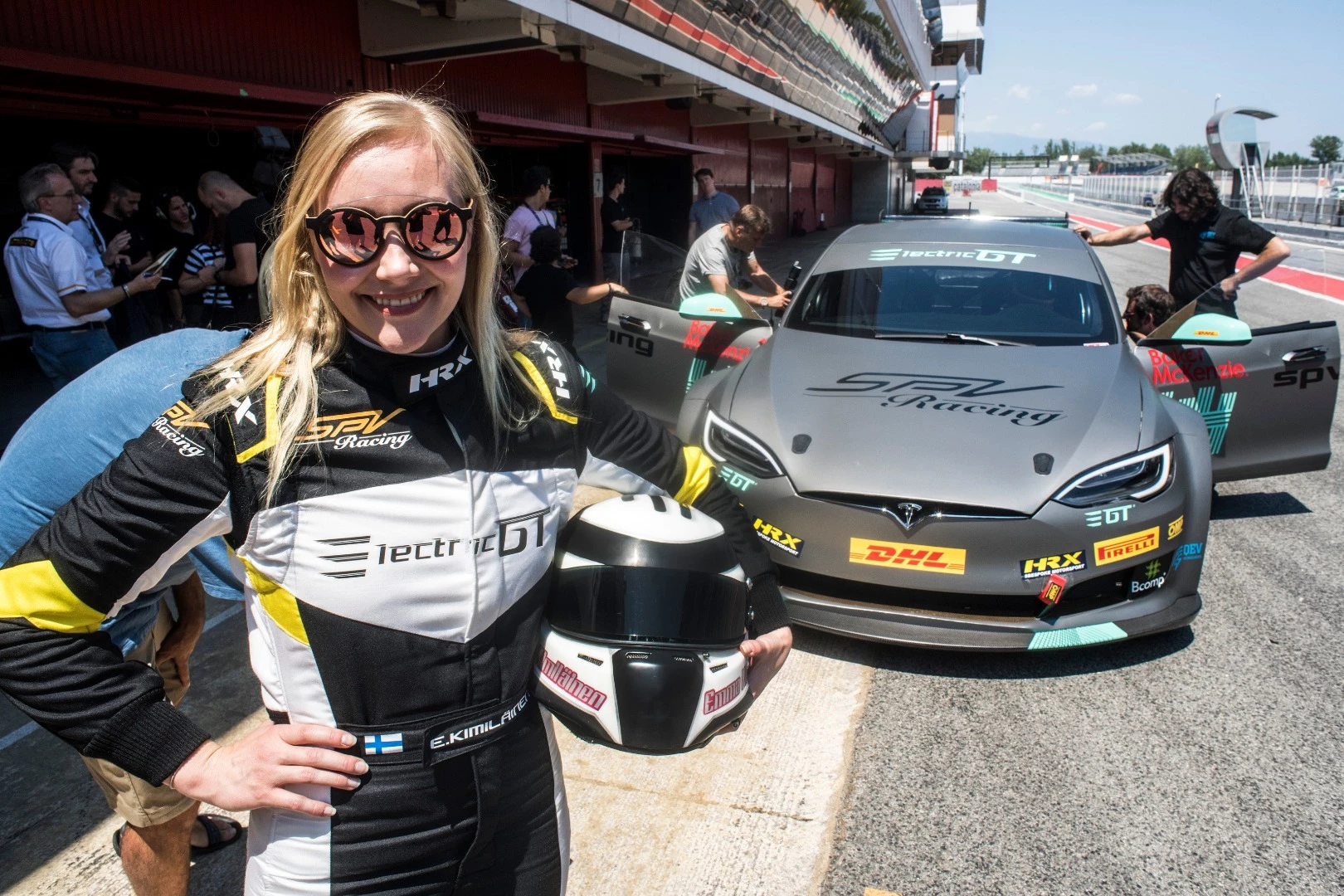 Driver Emma Kimiläinen gets ready to take the race-ready Tesla P100D for a spin around the track at Circuit de Barcelona-Catalunya