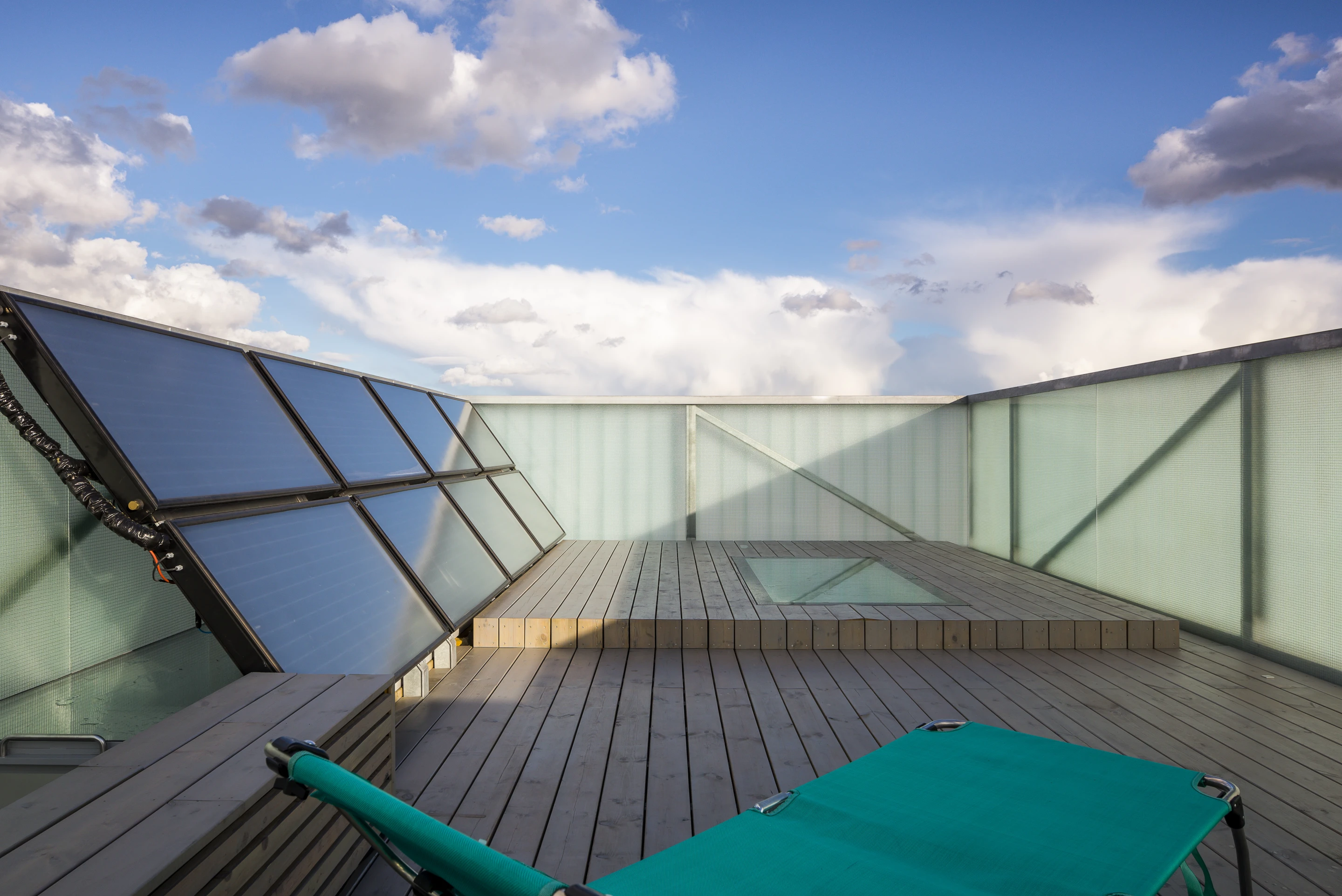 The upper box connects to a private roof terrace with wildflower garden and solar panels