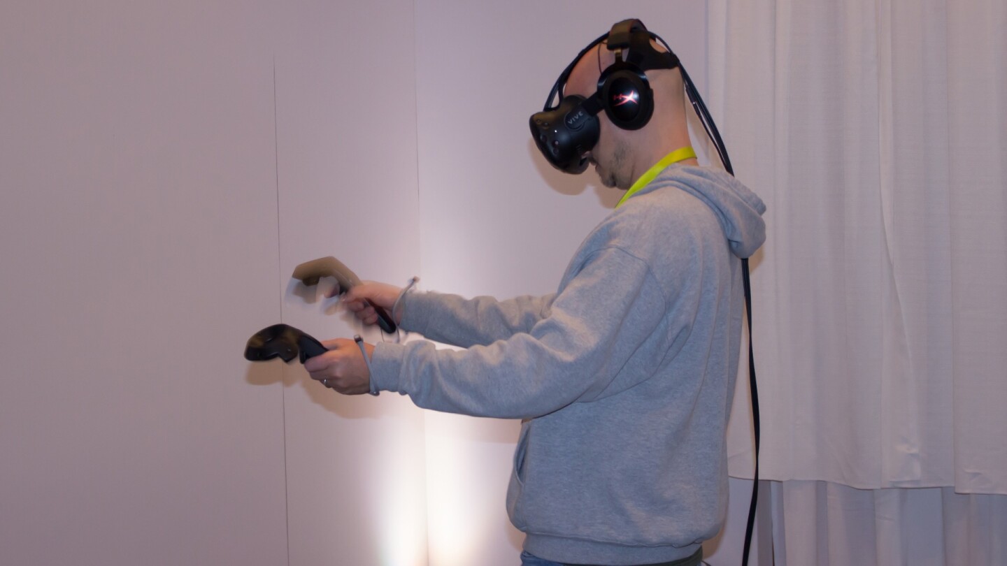 Playing in Job Simulator's office environment with the HTC Vive