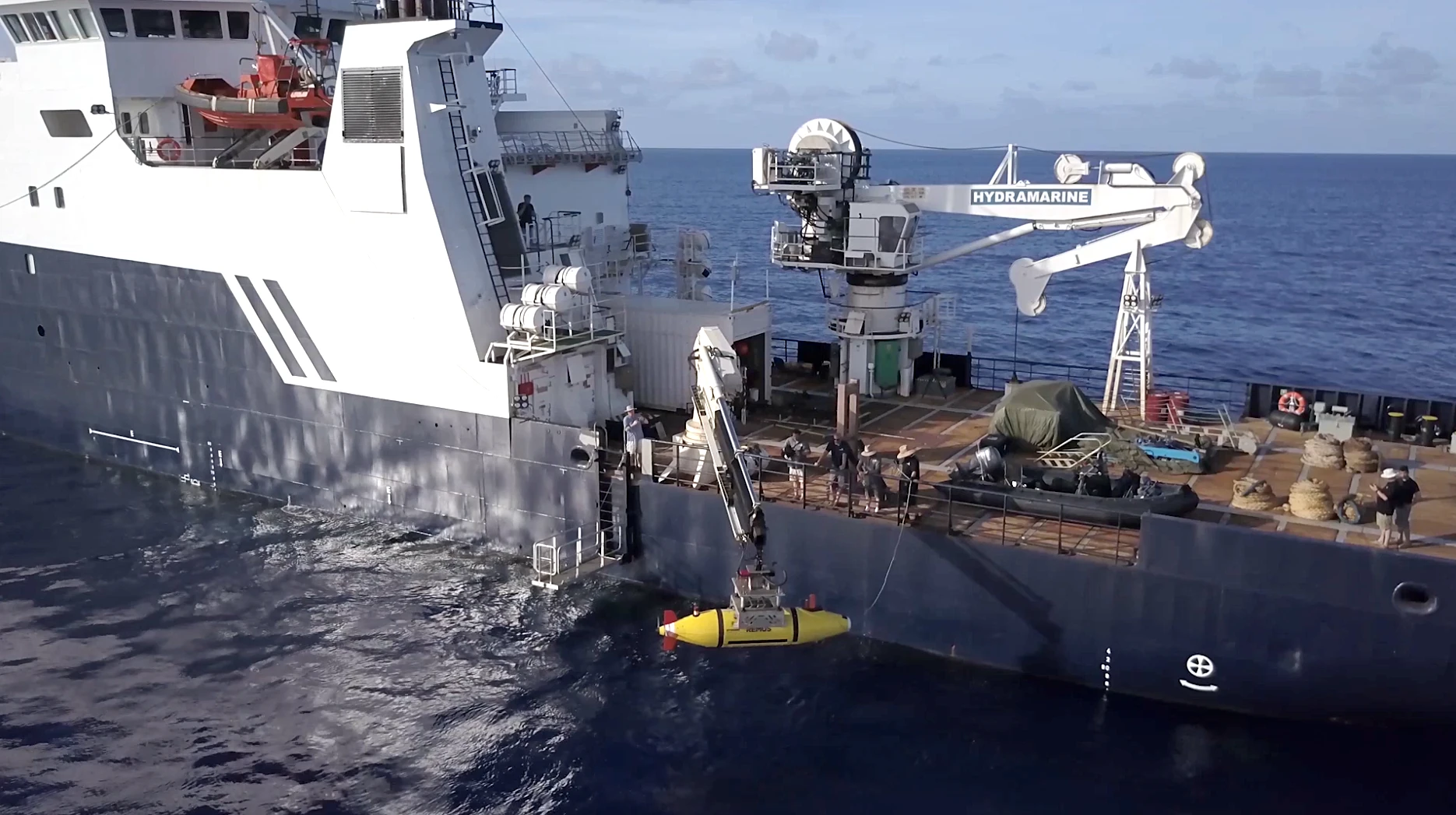 The AUV Hydroid Remus 6000 is deployed from the R/V Petrel in search of the USS Indianapolis