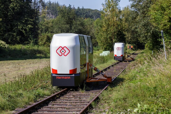 Two of the Monocabs making a trial run – these test models are equipped with extendible "catching devices" that keep them from tipping over in the event of a mishap