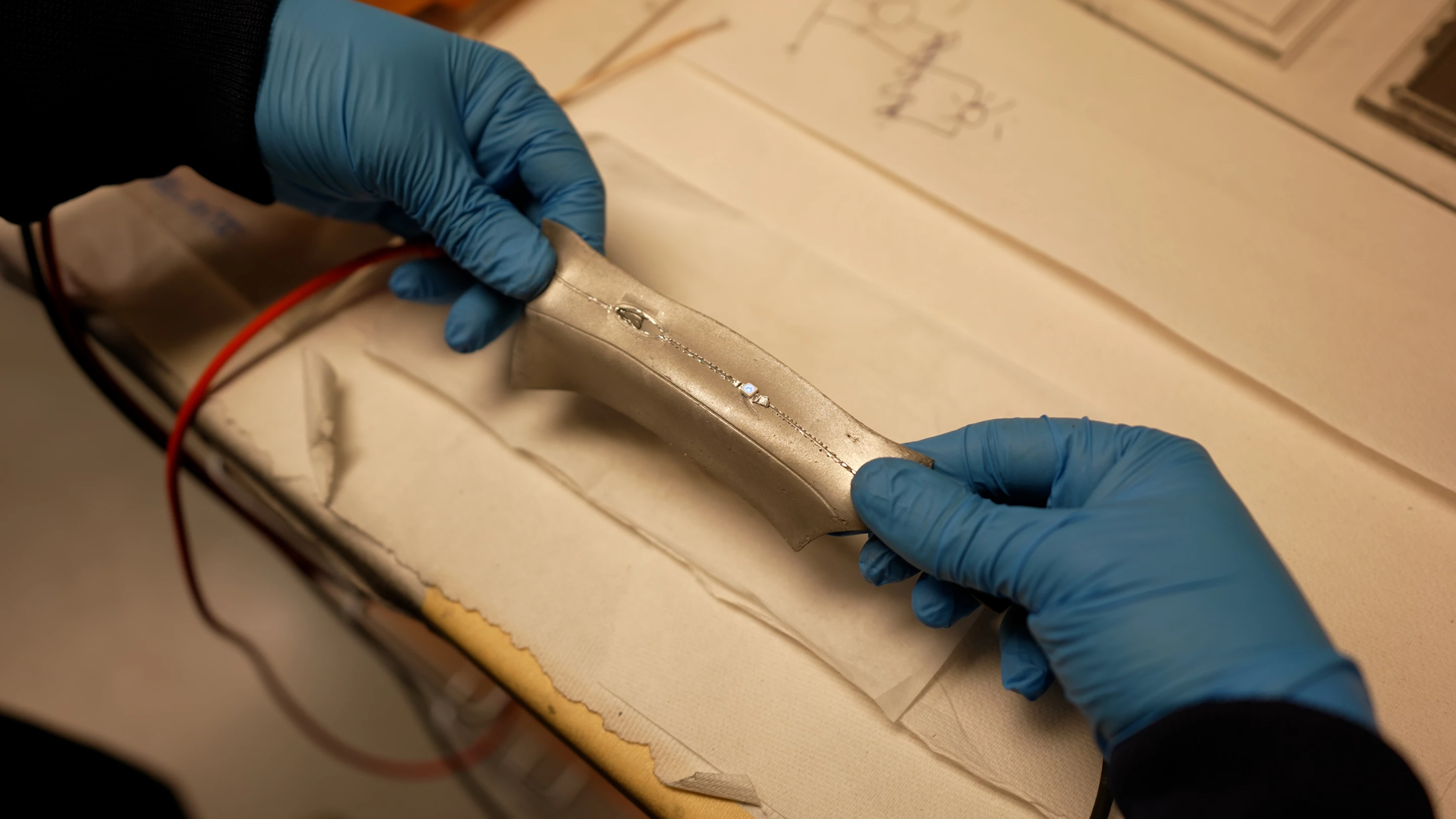 Electrical circuits within the material still work after being stretched or having holes punched in them