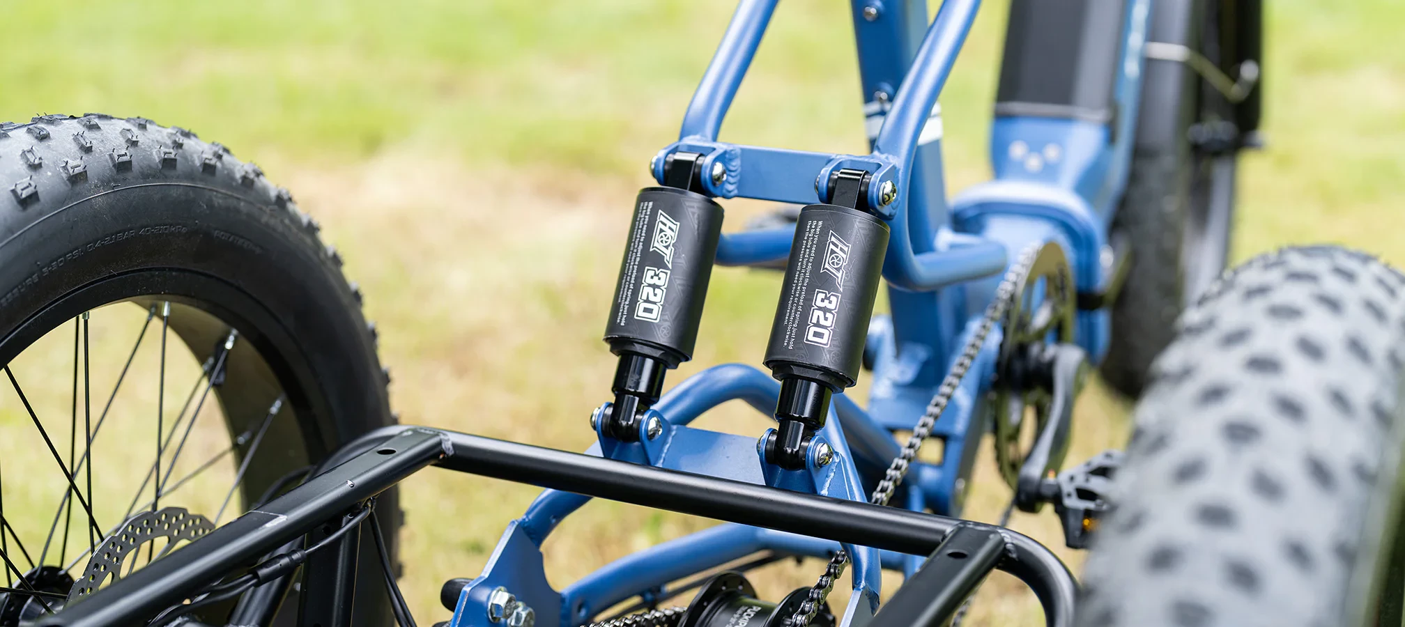 The adjustable suspension fork offers 80 mm of travel, and works with the dual shocks at the rear to smooth out uneven terrain