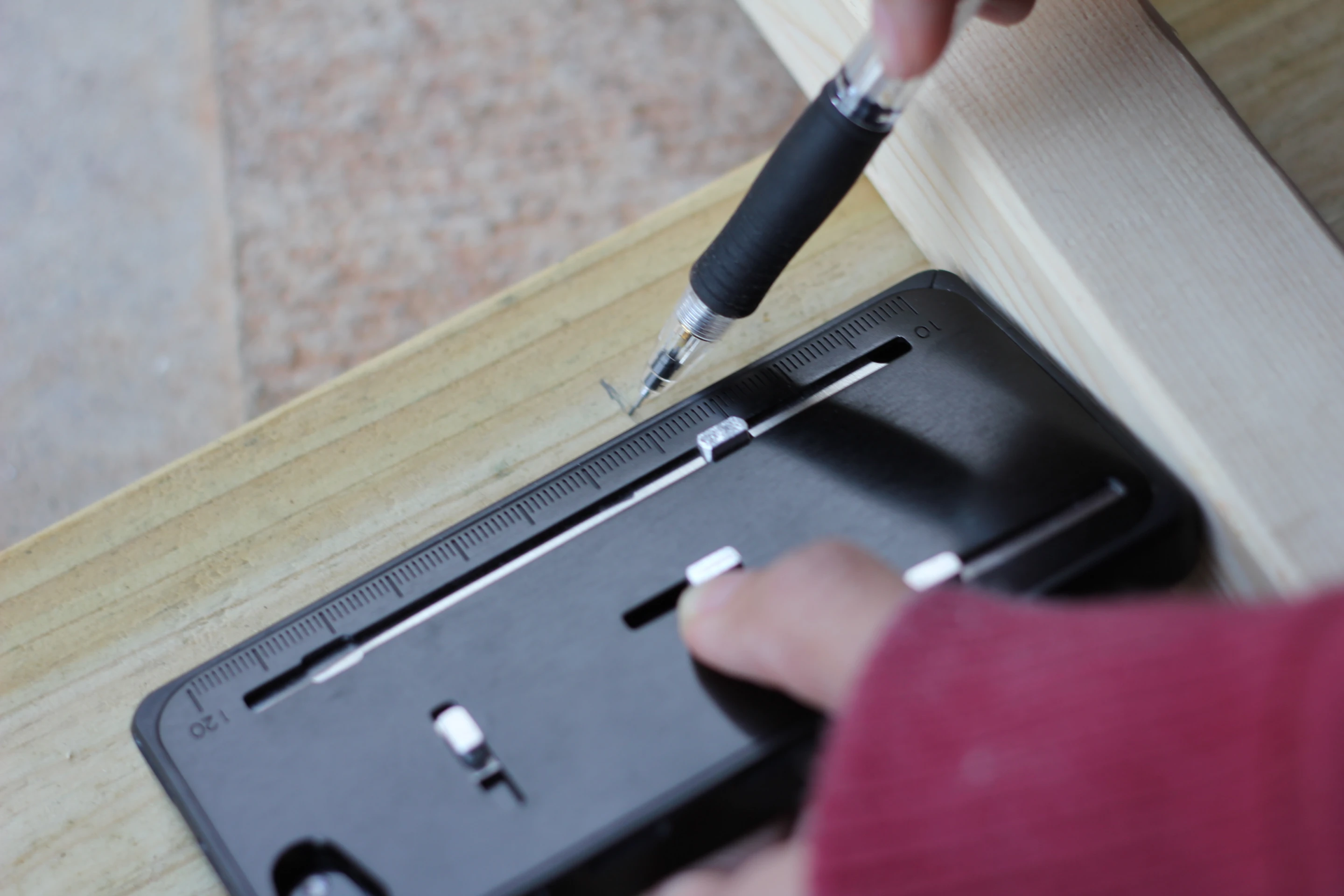 A series of buttons releases the tools