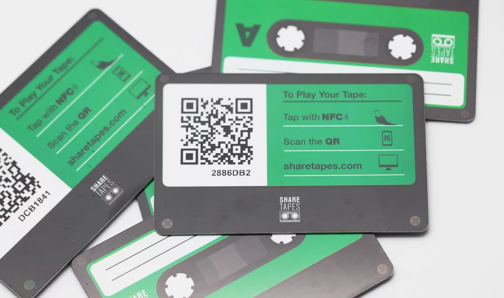 A stack of five Sharetapes cards for use with NFC and QR enabled smartphones
