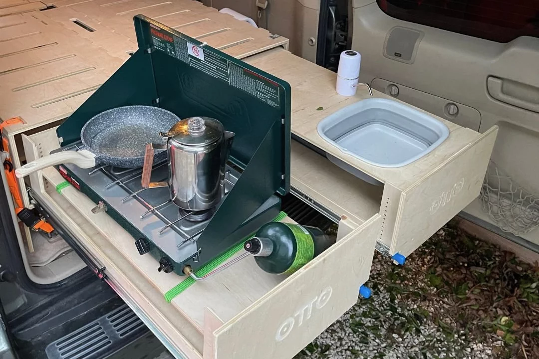 Removable lids on the Otto Nest's drawers allow them to serve as a pull-out kitchen