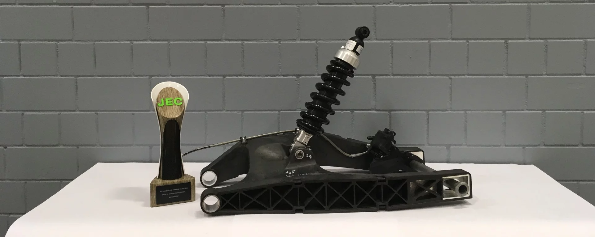 A carbon composite swingarm produced by BMW using fast and cost-effective manufacturing techniques. Looks like it could fit the G310 series bikes.