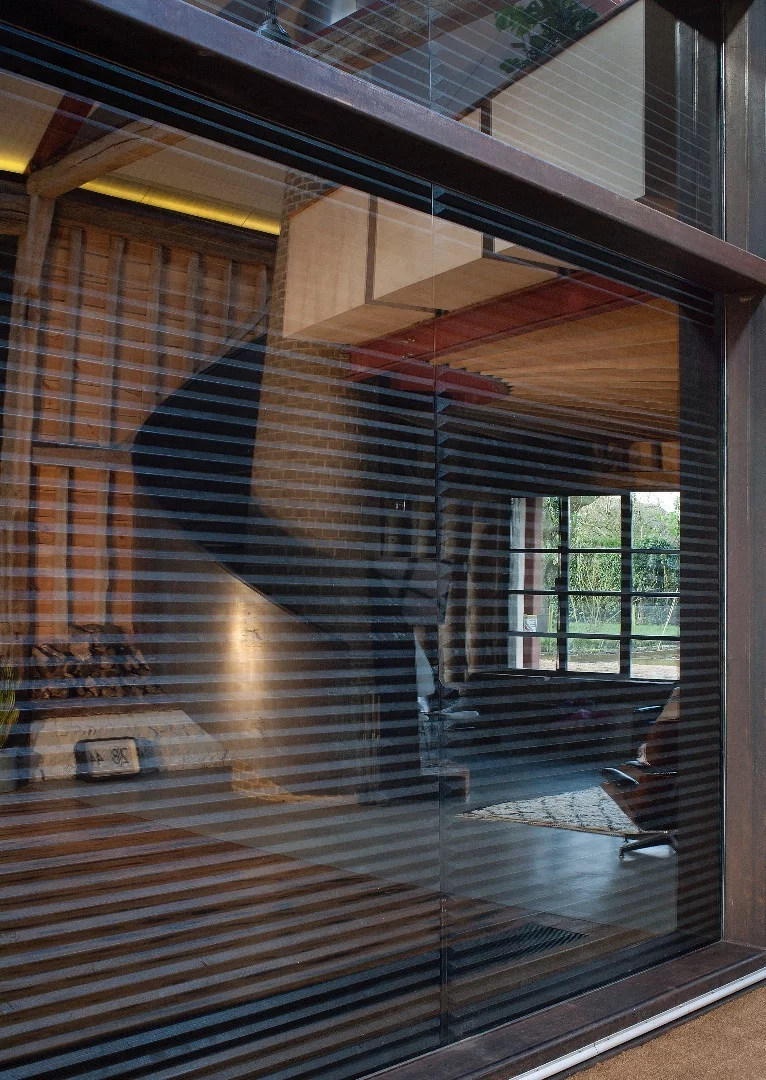 Living in a barn conversion can be a rather dark experience but this one has plenty of glazing