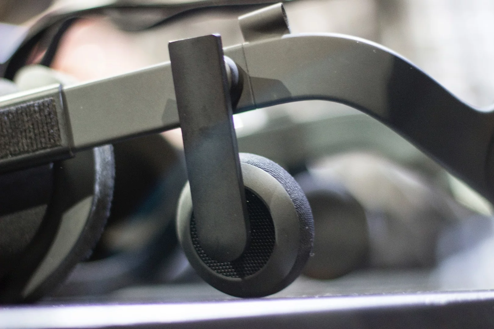 The headphones are built-in, but also removable (for cases where users want to use their own headphones)
