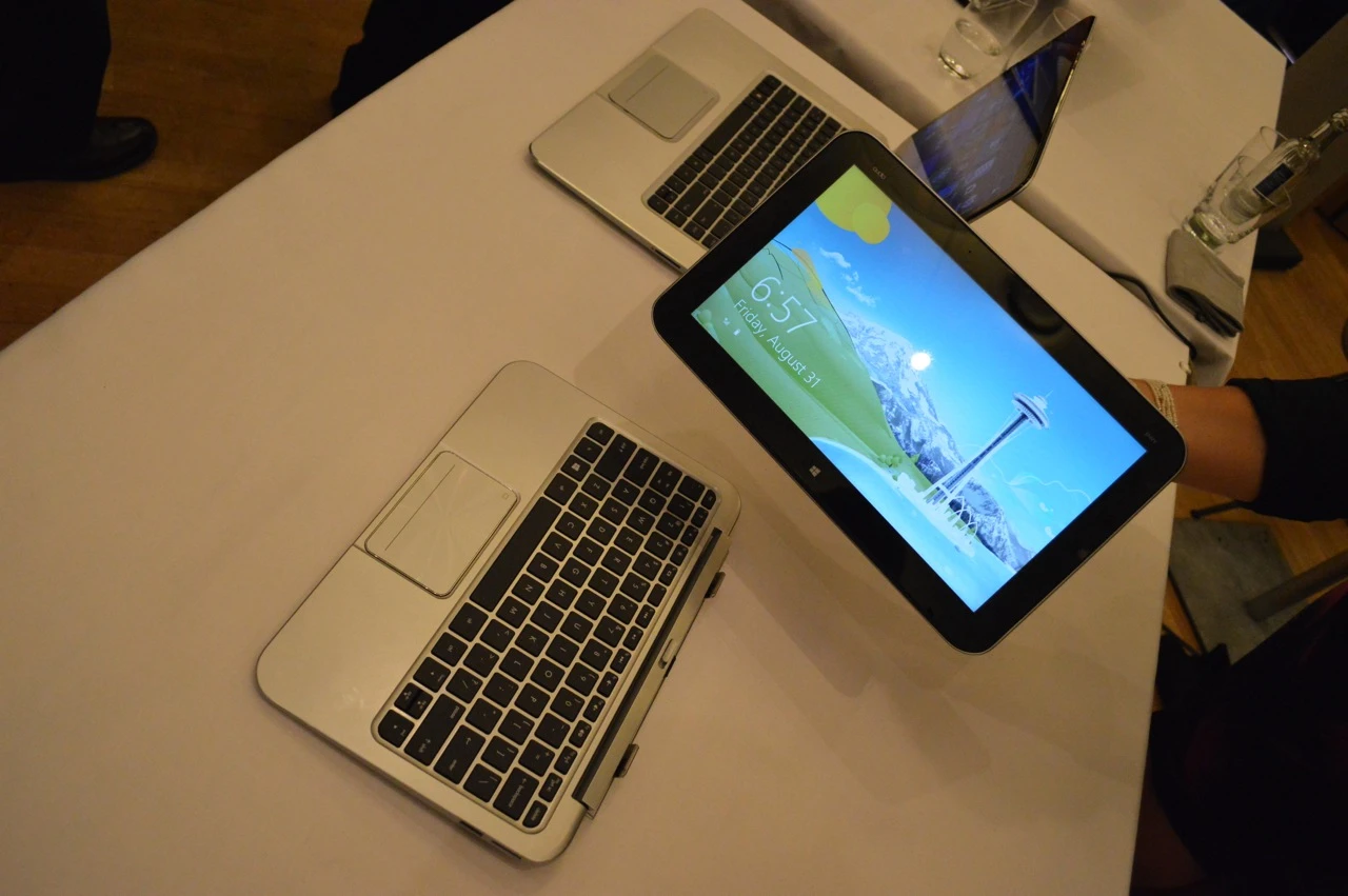 The ENVY x2 tablet device is released from the vice-like grip of the base via a magnetic toggle positioned above the chiclet-style keyboard