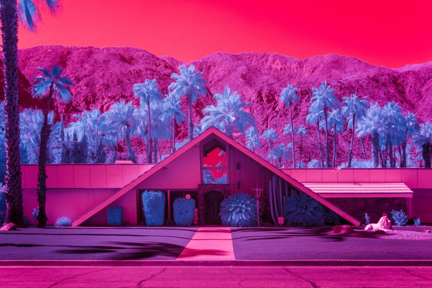 Kate Ballis’ series Infra Realism is an extreme and stylized take on the style, contrasting images of classic mid-century Palm Springs architecture with jarringly sharp and disorientating infrared purples and reds