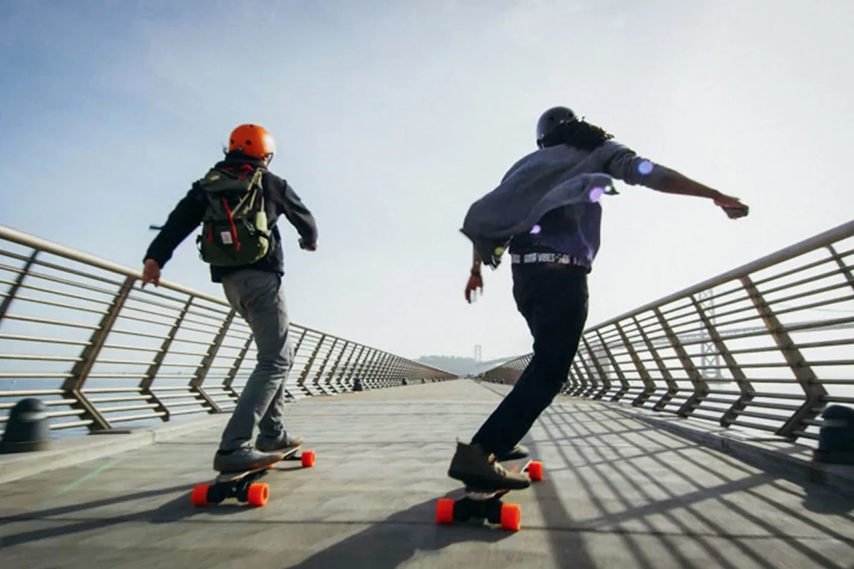 The second generation of Boosted Boards retain the bamboo deck and signature orange street wheels of the original