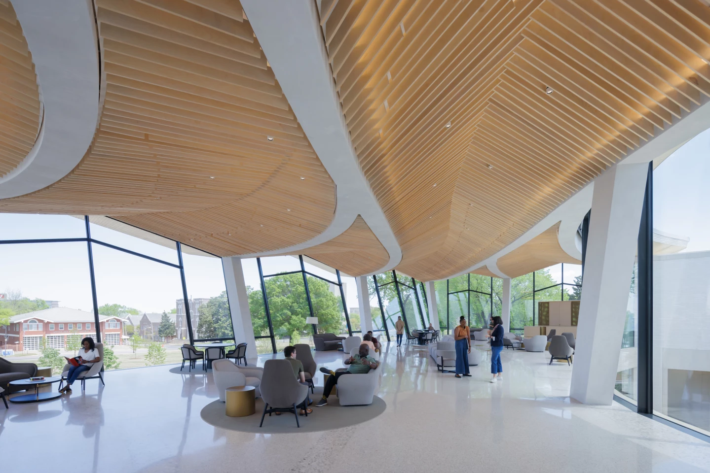 AMFA features an attractive timber ceiling and generous glazing, which maximizes daylight inside and offers excellent views of the area