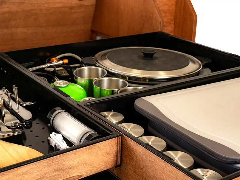 Each drawer holds specific cookware and tools
