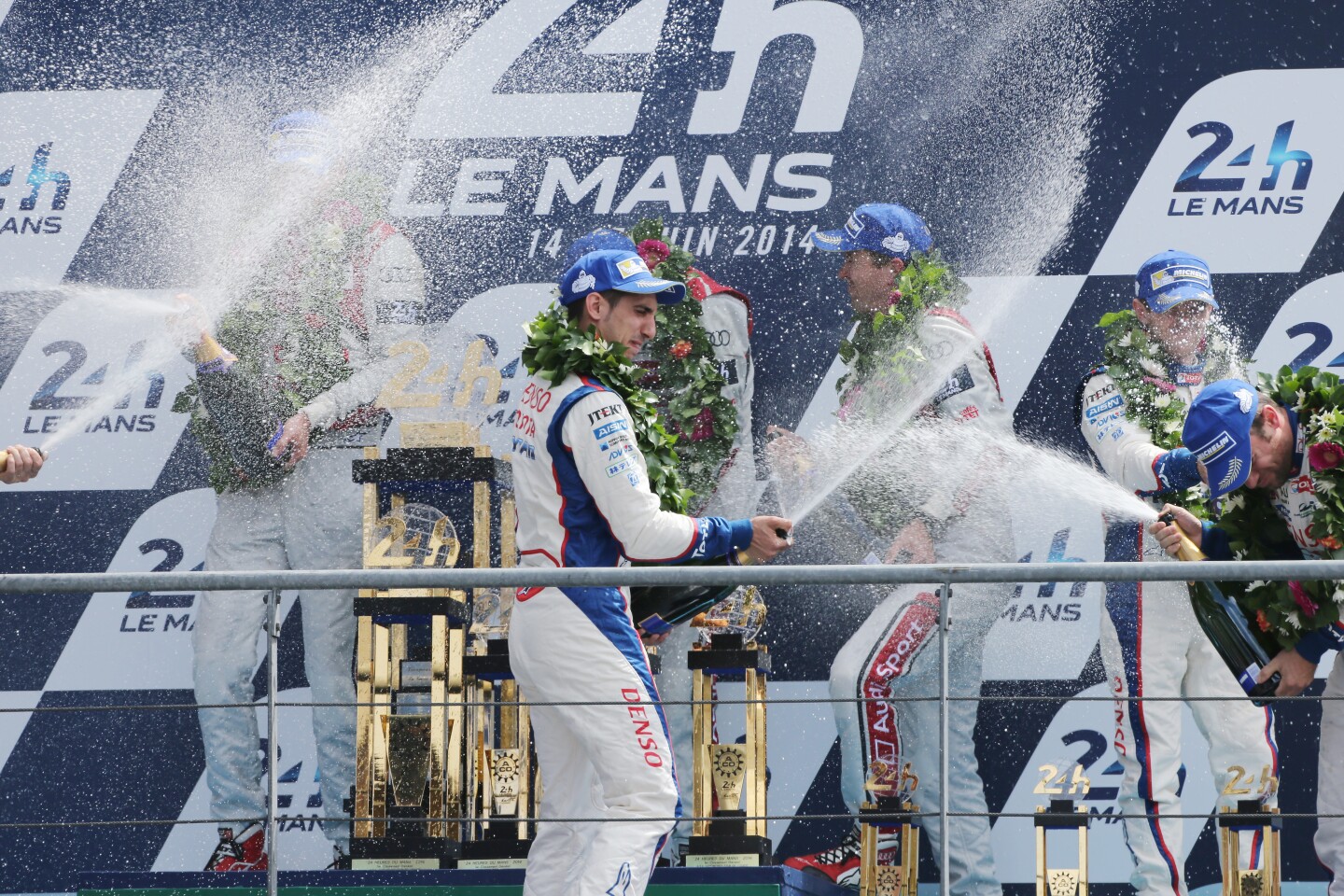 Toyota drivers celebrate the third place which retained the championship lead for the team