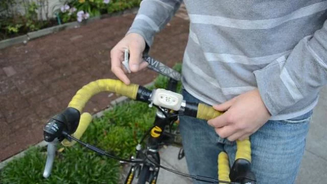 Bike mounting hardware transforms headlamp to bike light