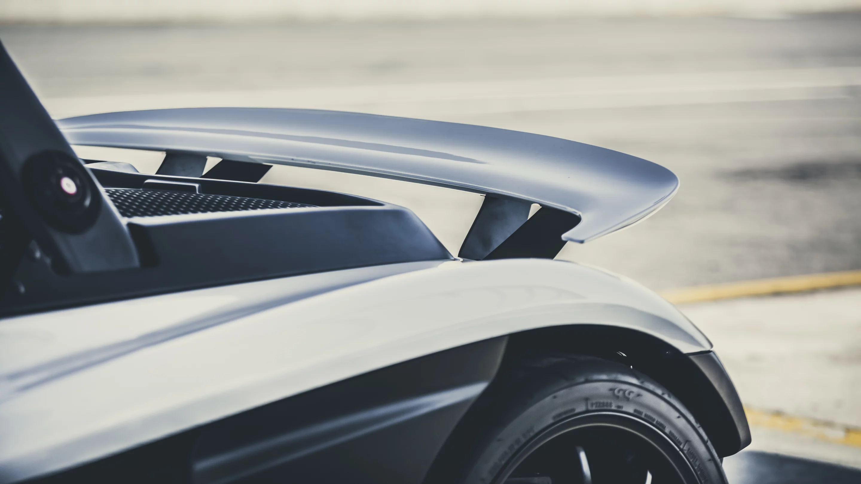 Fixed rear spoiler is of course standard to assist in providing downforce when needed