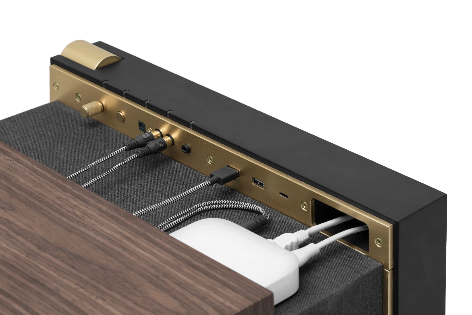 The wood veneer casing of the PR / 01 is pulled forward to reveal a hidden compartment that's home to audio and USB ports, and can stow away small gadgets