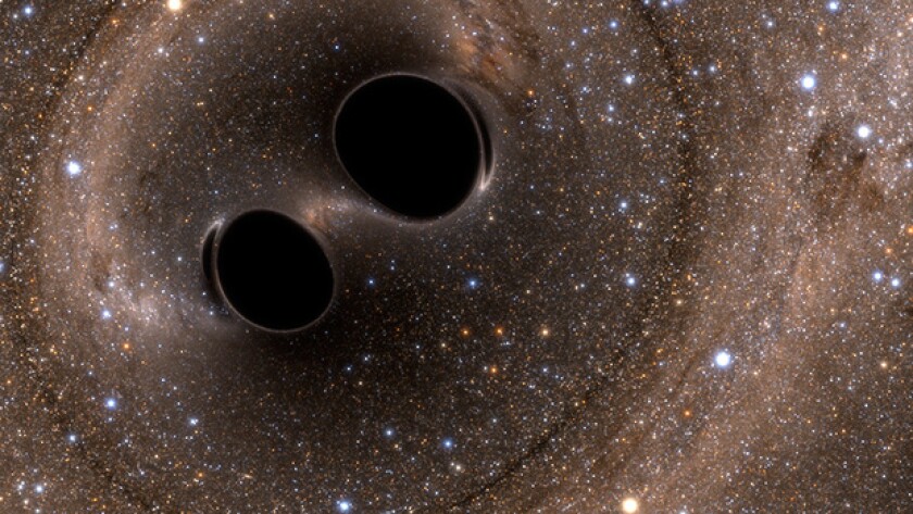 An artist's rendering of the two black holes that collided to produce the gravitational waves detected on Earth